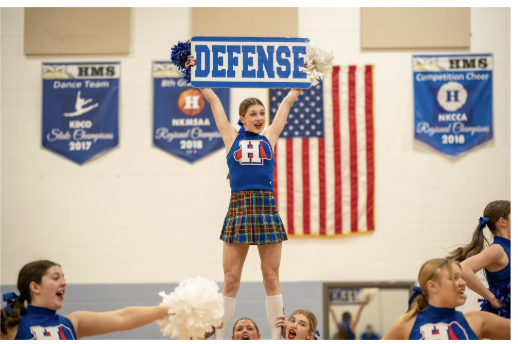 Chelsea Crisler (12) stunts during the HHS cheer showcase on February 4. 